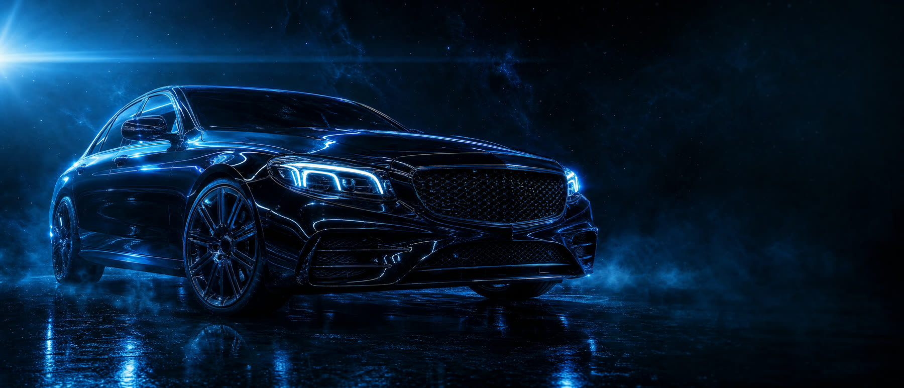 Polished black luxury sedan in a darkened studio under cool cyan lighting, mirror-finish paint catching cobalt highlights